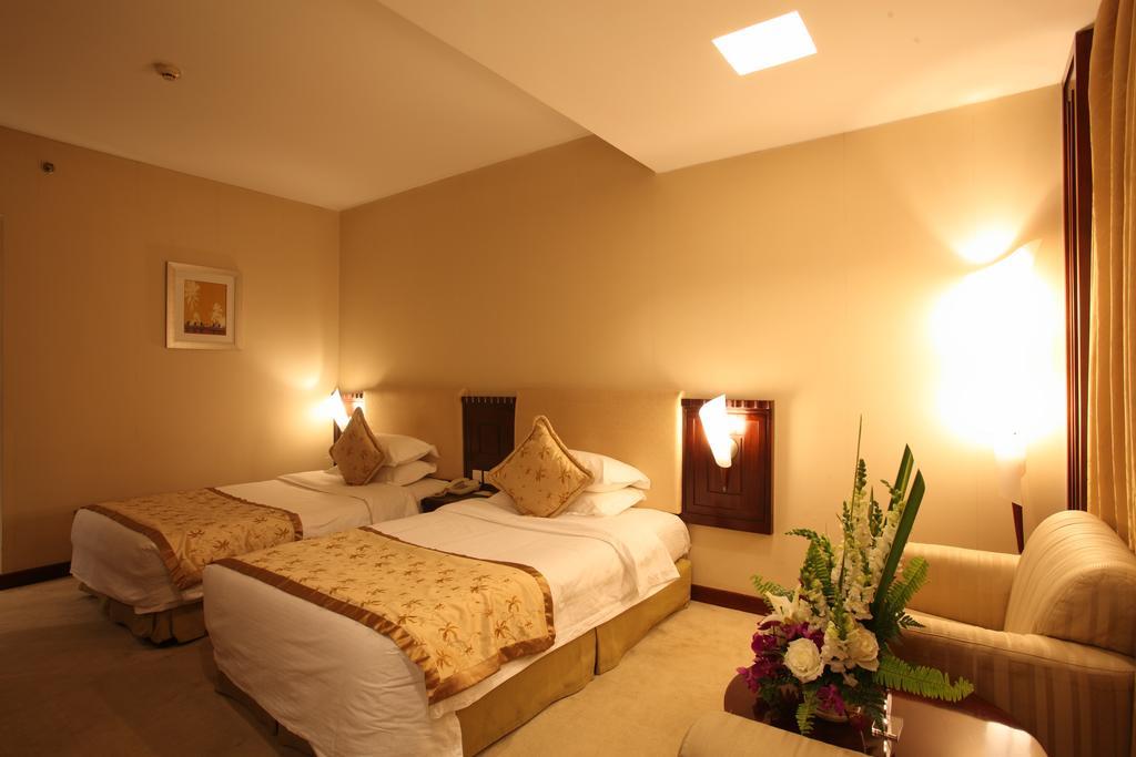 Beijing Wuhuan Hotel Szoba fotó