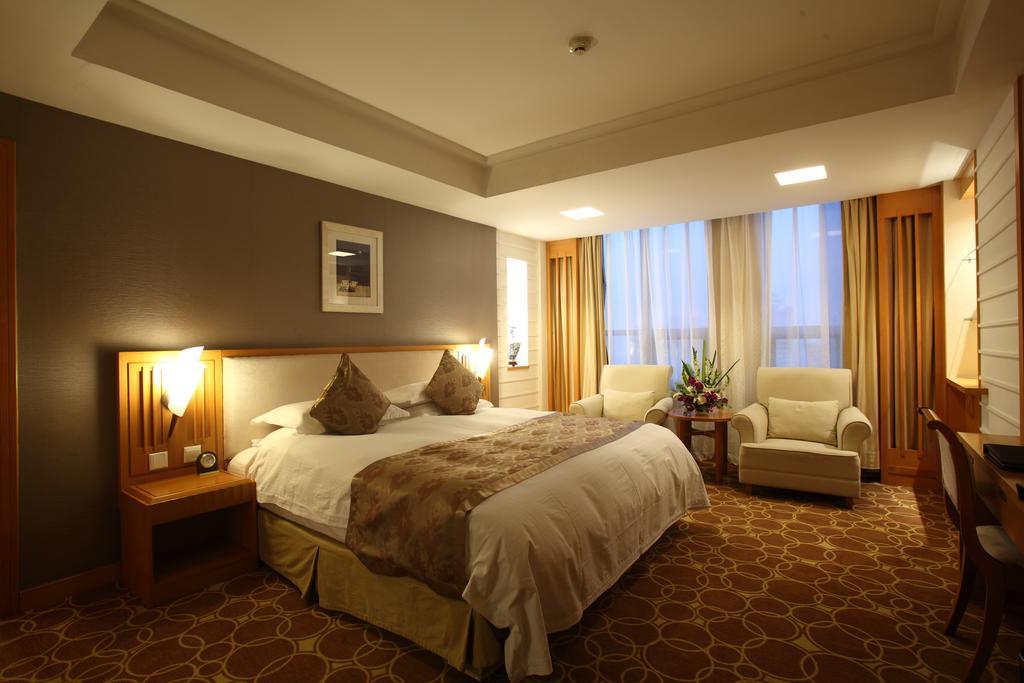 Beijing Wuhuan Hotel Szoba fotó