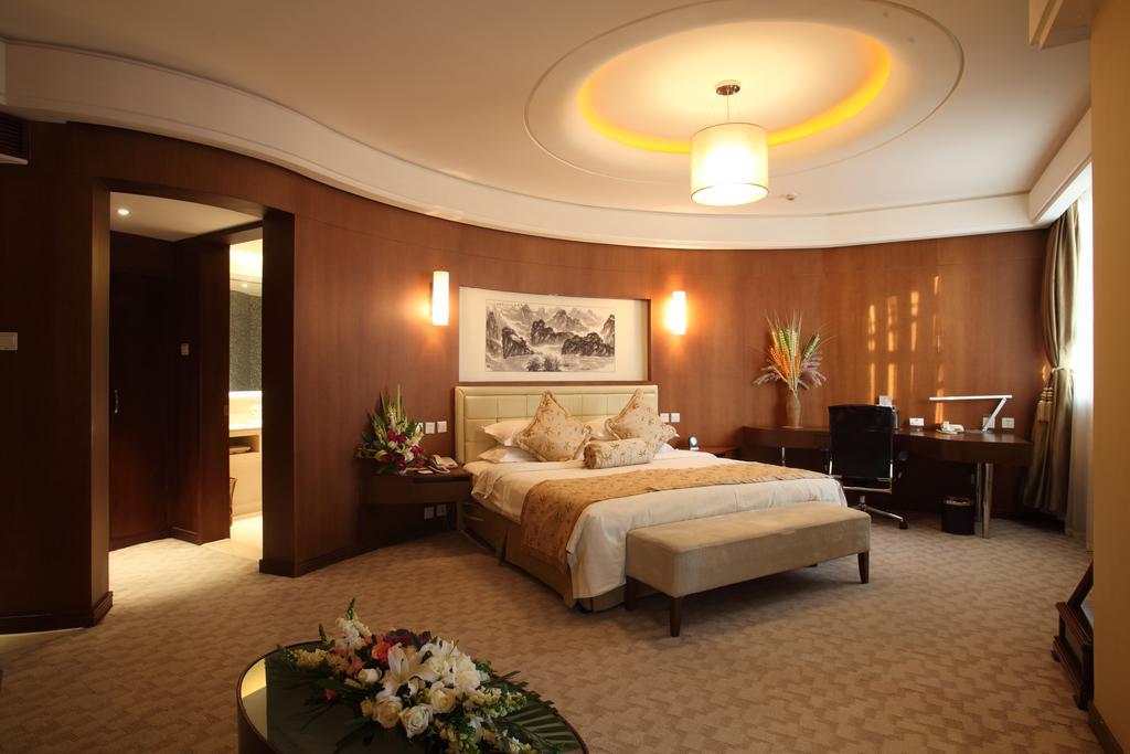 Beijing Wuhuan Hotel Szoba fotó