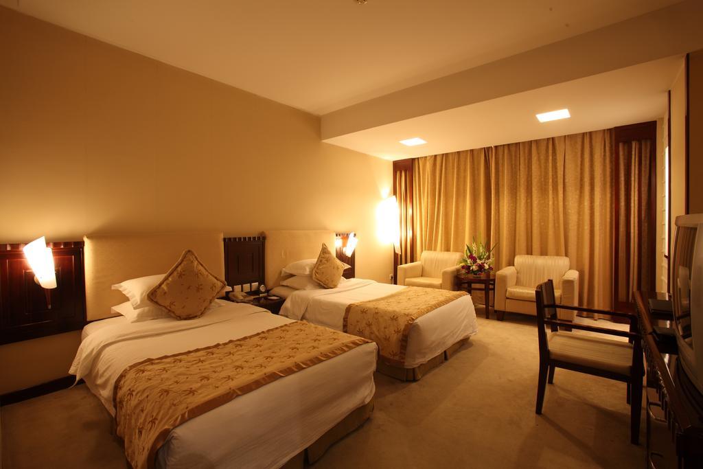 Beijing Wuhuan Hotel Szoba fotó