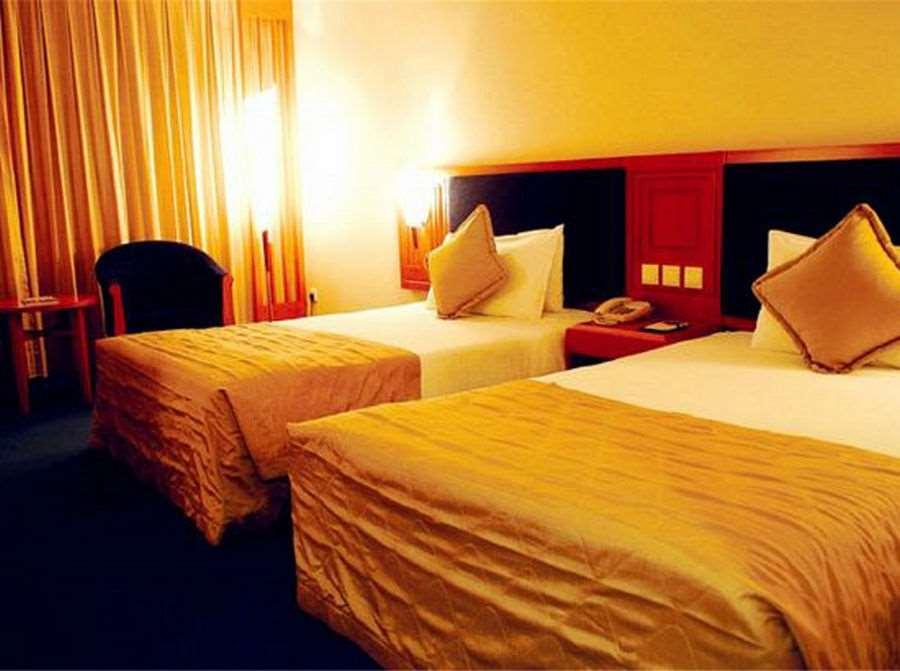 Beijing Wuhuan Hotel Szoba fotó