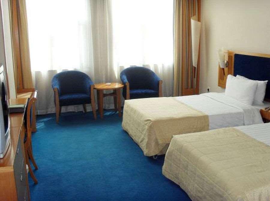 Beijing Wuhuan Hotel Szoba fotó