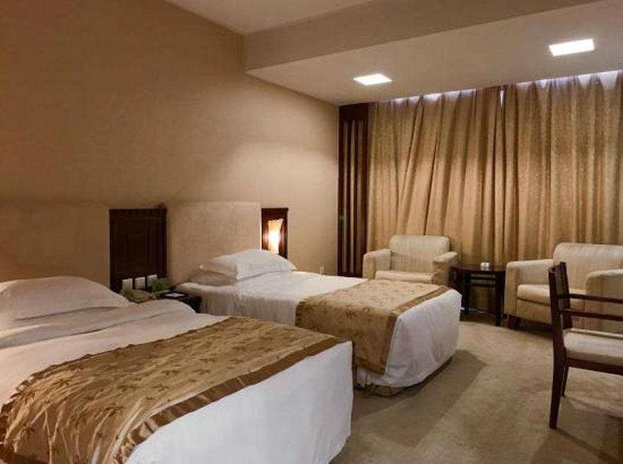 Beijing Wuhuan Hotel Szoba fotó