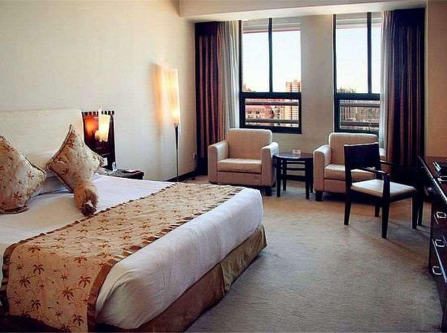 Beijing Wuhuan Hotel Szoba fotó